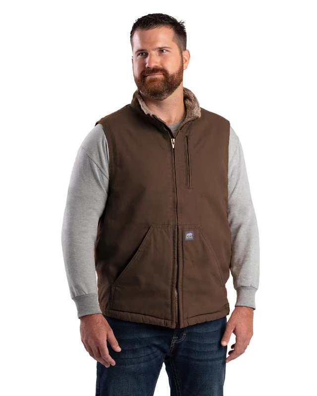 Customer wearing an insulated brown work vest from BK Outfitters